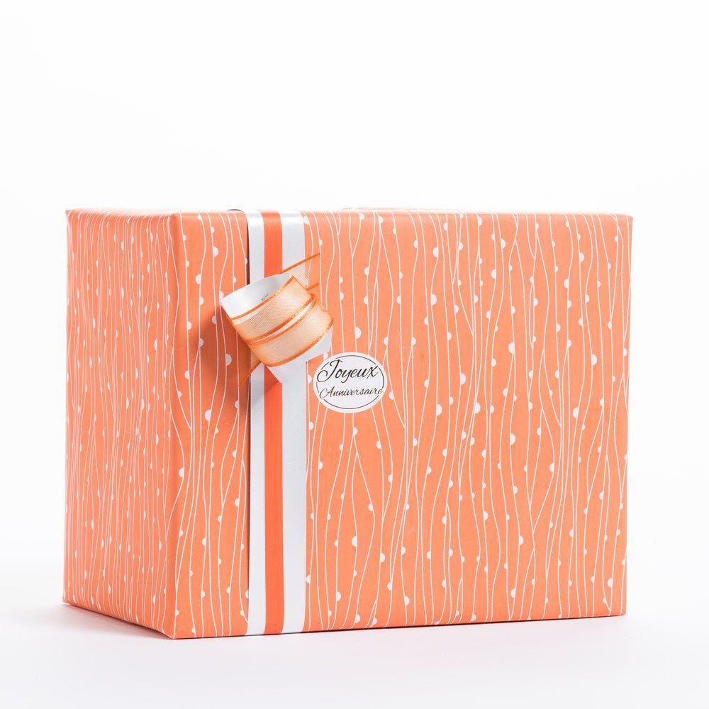 Papier cadeau corail et lignes blanches en 0.70x100 m Papier cadeau corail et lignes blanches en 0.70x100 m