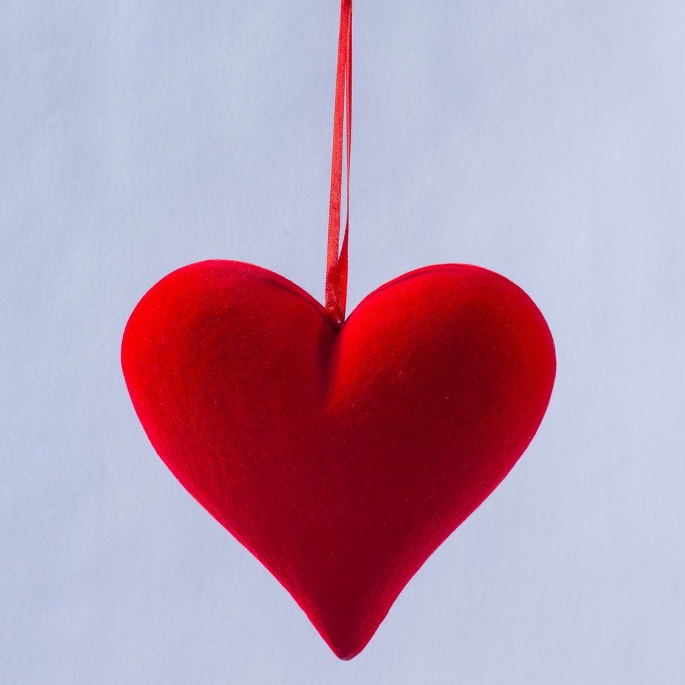 Coeur à suspendre rouge floqué L.20,5 x H.19cm Coeur à suspendre rouge floqué L.20,5 x H.19cm